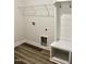 Mudroom with wood floors, a bench, and a coat rack at 59 Mossy Bridge Ct, Lillington, NC 27546