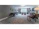 Spacious recreation room, perfect for entertaining, complete with a shuffleboard table at 684 Magnolia Acres Ln, Fuquay Varina, NC 27526