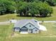 Gorgeous aerial view of the property backing to trees, showcasing its spacious layout at 70 Water Willow Ln, Zebulon, NC 27597