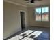 Bright and airy bedroom with a large window providing natural light at 70 Water Willow Ln, Zebulon, NC 27597