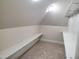 Bright walk-in closet features built-in shelving and ample storage space at 70 Water Willow Ln, Zebulon, NC 27597
