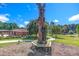 Unique community amenity with a bear sculpture, offering a charming outdoor space for gatherings at 27 Asti Ct, Clayton, NC 27527