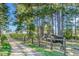 Lovely horse property featuring a rustic fence, with a tree-lined landscape at 27 Asti Ct, Clayton, NC 27527