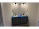 Bathroom with double sinks, modern fixtures, and recessed lighting at 5124 Grist Stone Way, Youngsville, NC 27596