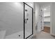 Bathroom boasts glass enclosed shower and tile floors at 5124 Grist Stone Way, Youngsville, NC 27596