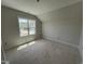 Bedroom featuring a window, offering a blank canvas for personalization and design at 5124 Grist Stone Way, Youngsville, NC 27596