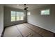 Bedroom featuring large windows and a ceiling fan at 5124 Grist Stone Way, Youngsville, NC 27596