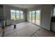Open dining area with sliding glass doors to a deck, and views of the backyard at 5124 Grist Stone Way, Youngsville, NC 27596