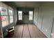 Dining room featuring wainscoting detail, a modern light fixture and large windows at 5124 Grist Stone Way, Youngsville, NC 27596