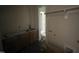 Laundry area with a sink, wood cabinets, dark tile flooring, and closet at 5124 Grist Stone Way, Youngsville, NC 27596