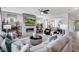 Spacious living room with fireplace, built-in shelving, and large sectional sofa at 1024 Dillon Lake Dr, Knightdale, NC 27545