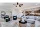 Open living room showcasing stylish furniture and seamless flow to kitchen and dining at 1024 Dillon Lake Dr, Knightdale, NC 27545