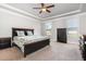 Spacious bedroom featuring a ceiling fan and neutral decor with ample natural light at 1024 Jarrett Bay Rd, Willow Springs, NC 27592