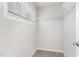 Walk-in closet showing built-in shelving for organized storage and functionality at 1024 Jarrett Bay Rd, Willow Springs, NC 27592
