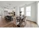 Elegant dining room with a view of the kitchen, perfect for Gathering gatherings and entertaining guests at 1425 Patchings Ln, Knightdale, NC 27545