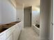 Bathroom with a tub and a vanity that provides ample space for relaxation and convenience at 180 Deodora Ln, Cameron, NC 28326