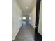 Inviting entryway with wood-look flooring that flows seamlessly into the living spaces at 180 Deodora Ln, Cameron, NC 28326
