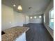 Bright open-concept kitchen that connects seamlessly to a spacious living area at 180 Deodora Ln, Cameron, NC 28326