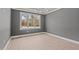 Bedroom with neutral paint and hardwood floors at 418 S Cross St, Youngsville, NC 27596