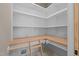 Spacious walk-in pantry with ample shelving and custom storage solutions at 418 S Cross St, Youngsville, NC 27596