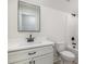 Bathroom featuring a modern vanity, subway tiled shower, and neutral finishes at 50 N Rowsham Pl, Smithfield, NC 27577
