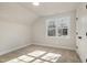 Neutral bedroom featuring a bright window, carpet, and neutral paint at 50 N Rowsham Pl, Smithfield, NC 27577