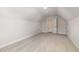 Bonus room features carpet, neutral paint, vaulted ceilings, and hidden closets at 50 N Rowsham Pl, Smithfield, NC 27577