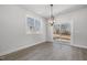 Dining area with abundant natural light, featuring a sliding glass door to the patio at 50 N Rowsham Pl, Smithfield, NC 27577