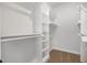 Spacious walk-in closet with ample shelving and storage space for organization at 50 N Rowsham Pl, Smithfield, NC 27577