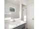 Bathroom featuring a vanity with countertop and mirror, plus an open doorway at 611 Highview Dr, Benson, NC 27504