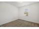 Neutral bedroom with carpet, window, and recessed lighting at 611 Highview Dr, Benson, NC 27504