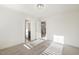 Neutral bedroom with adjoining rooms visible through doorways at 611 Highview Dr, Benson, NC 27504