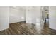 Spacious dining area with hardwood floors, wainscoting, and ample natural light at 611 Highview Dr, Benson, NC 27504
