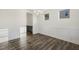 Elegant dining room featuring hardwood floors, wainscoting, and a stylish chandelier at 611 Highview Dr, Benson, NC 27504
