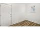 Bright entryway featuring wood-look flooring, a window, and a sturdy white door at 611 Highview Dr, Benson, NC 27504