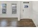 Welcoming foyer with hardwood flooring, crisp white walls, and abundant natural light at 611 Highview Dr, Benson, NC 27504