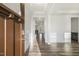 Bright foyer features hardwood floors, wainscoting, and views into the living spaces at 611 Highview Dr, Benson, NC 27504