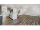 Spacious open-concept kitchen featuring a large island and views to the living room and staircase at 611 Highview Dr, Benson, NC 27504