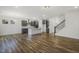 Open living space boasts stainless appliances and hardwood floors at 611 Highview Dr, Benson, NC 27504