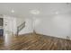 Open-concept living room with hardwood floors and natural light at 611 Highview Dr, Benson, NC 27504