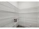 Walk-in pantry with wire shelving provides ample storage space at 611 Highview Dr, Benson, NC 27504
