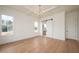 Bedroom with sliding barn door to en suite bath at 8624 Dukes Lake Rd, Zebulon, NC 27597