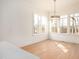Bright living room with large windows and hardwood floors at 8624 Dukes Lake Rd, Zebulon, NC 27597