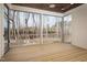 Relaxing screened porch with wood ceiling and view at 8624 Dukes Lake Rd, Zebulon, NC 27597