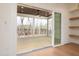 Covered screened porch offering an outdoor space with view of nature at 8624 Dukes Lake Rd, Zebulon, NC 27597