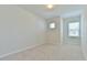 Cozy bedroom with neutral carpet and natural light from two windows at 140 Norwell Ln, Pittsboro, NC 27312