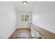 Bright home office with hardwood floors, natural light, and built-in desk at 1306 Lennox Pl, Raleigh, NC 27612