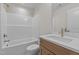This bright bathroom features a shower and bathtub combination with a white vanity sink at 25 Basil Ct, Franklinton, NC 27525