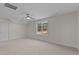 Bright bedroom with large window, ceiling fan and neutral carpeting at 25 Basil Ct, Franklinton, NC 27525