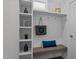 Mudroom featuring a built-in bench, shelving, and decorative accents at 25 Basil Ct, Franklinton, NC 27525